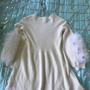 White dress with furry sleeves